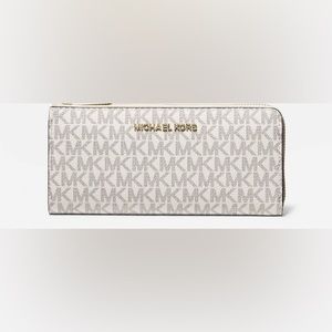 Michael Kors jetset large wallet, new with tags, vanilla with logo